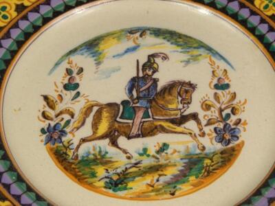 A Continental tin glazed charger - 2