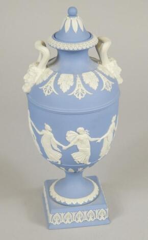 A Wedgwood blue Jasperware two handled vase and cover