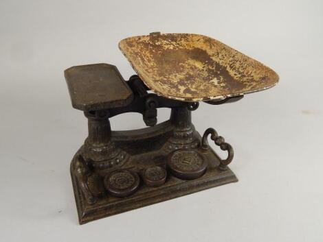 A set of cast iron scales and weights