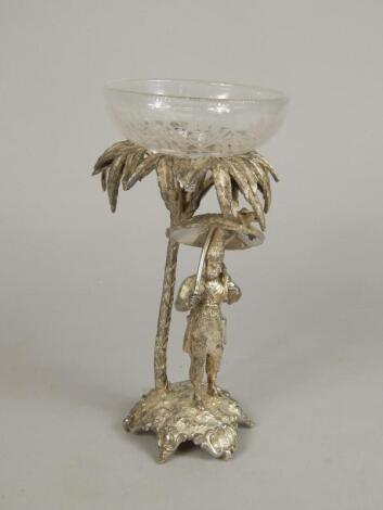 A 20thC Robinson Crusoe centrepiece figure group by Walker & Hall