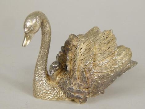 A 20thC figure group of swan and signets