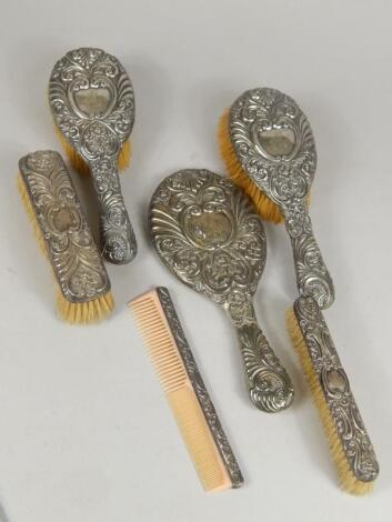 A Victorian silver backed dressing table set