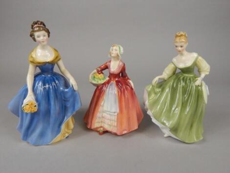 Three Royal Doulton porcelain ladies