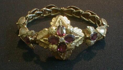 A Victorian bloomed gold garnet set bracelet