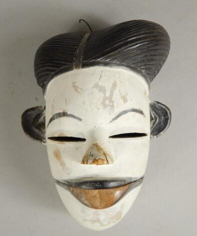 Tribal Art. An African carved wooden mask