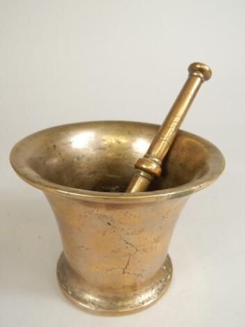 An 18thC bronze pestle and mortar