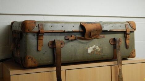 A leather and canvas trunk