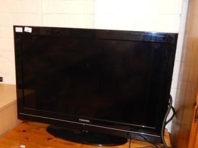 A Toshiba LCD TV with 32" screen