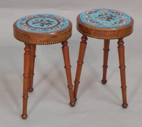 A pair of Victorian walnut and beadwork occasional tables