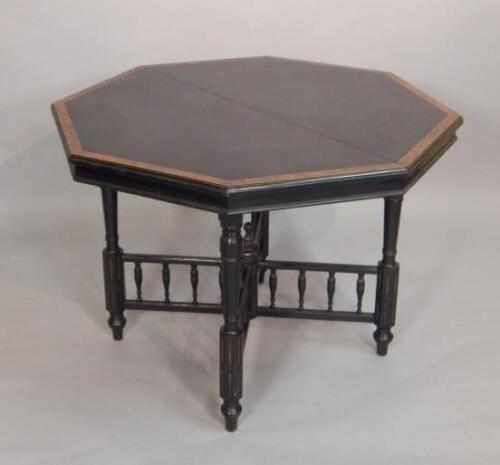 A Victorian ebonised and yew banded Aesthetic style table