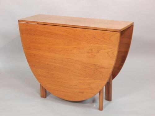 A retro style teak drop leaf table