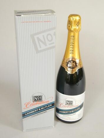 A bottle of Lambert & Butler promotional Champagne.