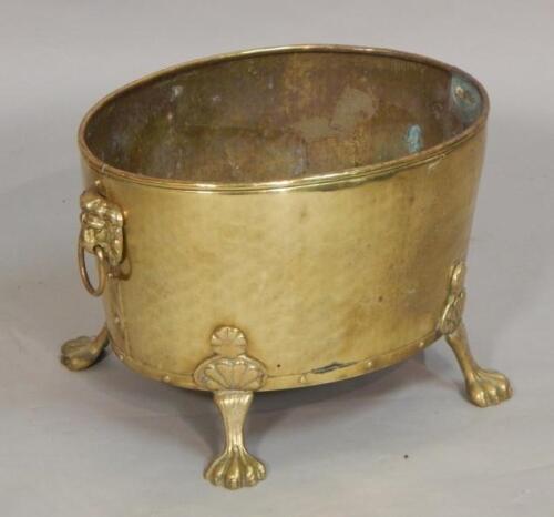 A brass planter.