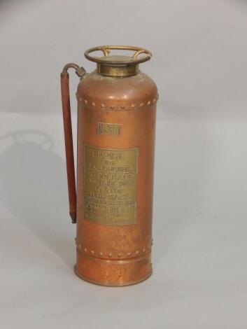 An Empire copper and gilt metal fire extinguisher