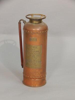 An Empire copper and gilt metal fire extinguisher