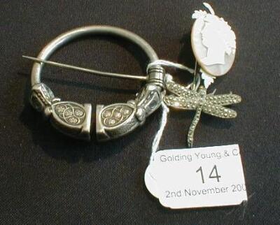 A Celtic shawl pin, a cameo brooch and a marcasite insect brooch