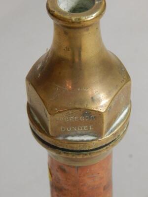 A copper and brass fireman's hose nozzle - 2