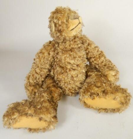 An unusual brown plush Teddy bear