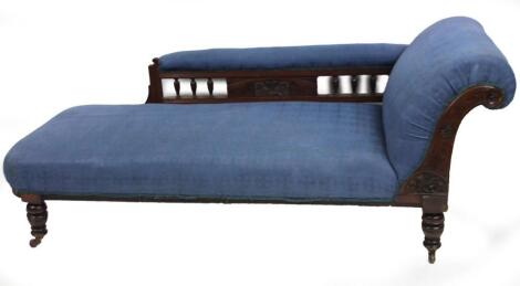 A late Victorian walnut stained chaise lounge