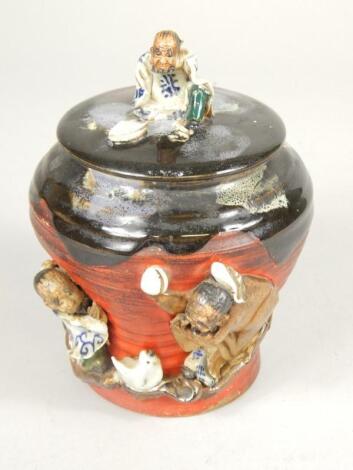 A Japanese porcelain jar and cover