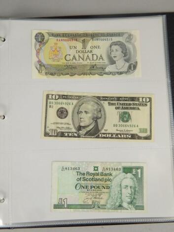 An album of approximately 60 uncirculated bank notes