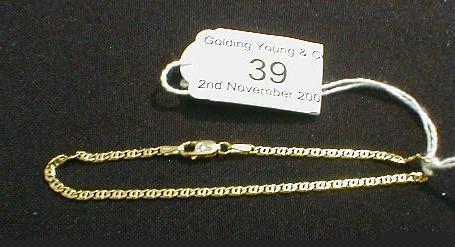 A yellow metal fine fancy linked bracelet stamped 750