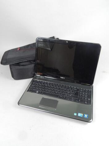 A Dell laptop and case