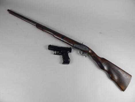 A KWL ball bearing gun and a reproduction musket