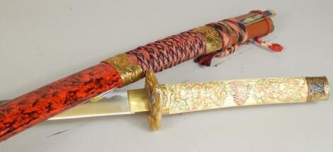 A reproduction Japanese sword with simulated ivory handle