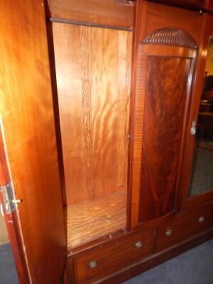 An Edwardian mahogany and tulip wood banded triple wardrobe - 2