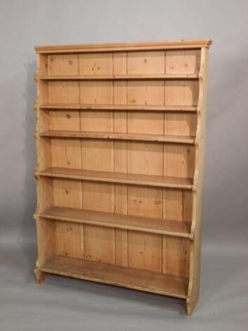 A pine waterfall open bookcase