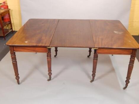 A George III mahogany D end extending dining table