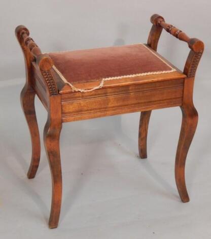 An early 20thC stained beech piano stool