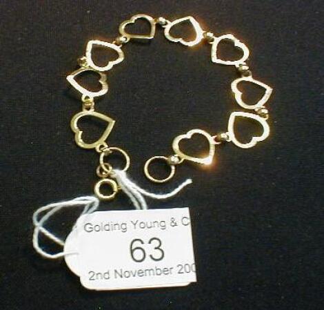 A 9ct gold linked heart bracelet