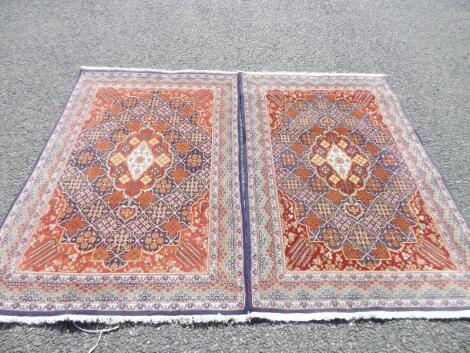 A pair of oriental rugs