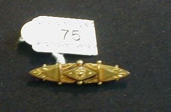 A Victorian 15ct gold bar brooch