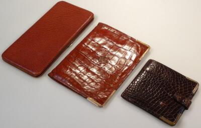 A mid-20thC 9ct gold mounted leather alligator finish wallet