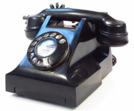 A mid-20thC black Bakelite telephone