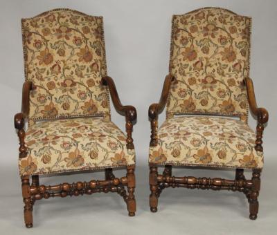 A pair of William and Mary style walnut armchairs