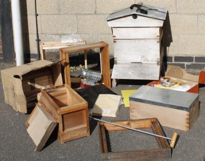 A quantity of various modern bee keeping equipment