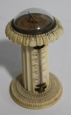 A Victorian Anglo-Indian carved ivory desk thermometer and compass