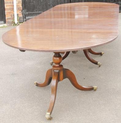 A 19thC mahogany D-end extending dining table