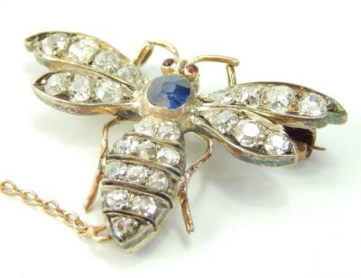 A diamond and gem set yellow and white metal insect brooch