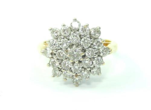 An 18ct gold and diamond flower head cluster ring