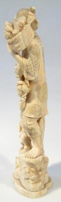 A late 19thC ivory figure group - 2