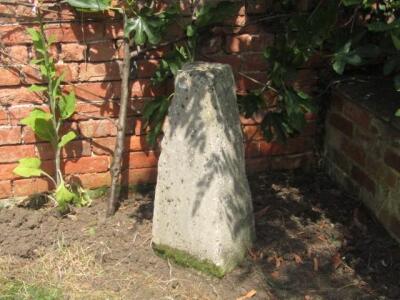 A staddle stone base.