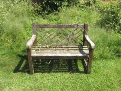 A pair of hardwood garden benches