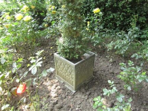 A pair of lead effect square garden planters