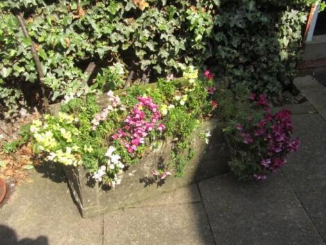 A hand hewn stone trough