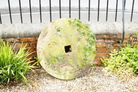 A hand hewn millstone